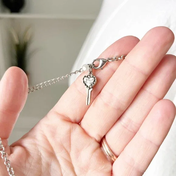 Betsey Johnson Bronze Blue Rhinestone Embellished Bow Statement Necklace - Picture 5 of 5